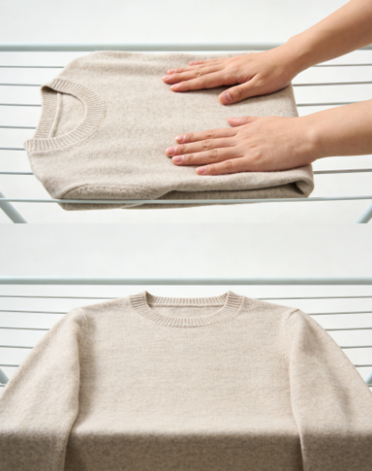 The cashmere sweater is laid flat on the shelf