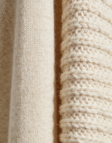High-gauge cashmere knit showing dense and refined construction